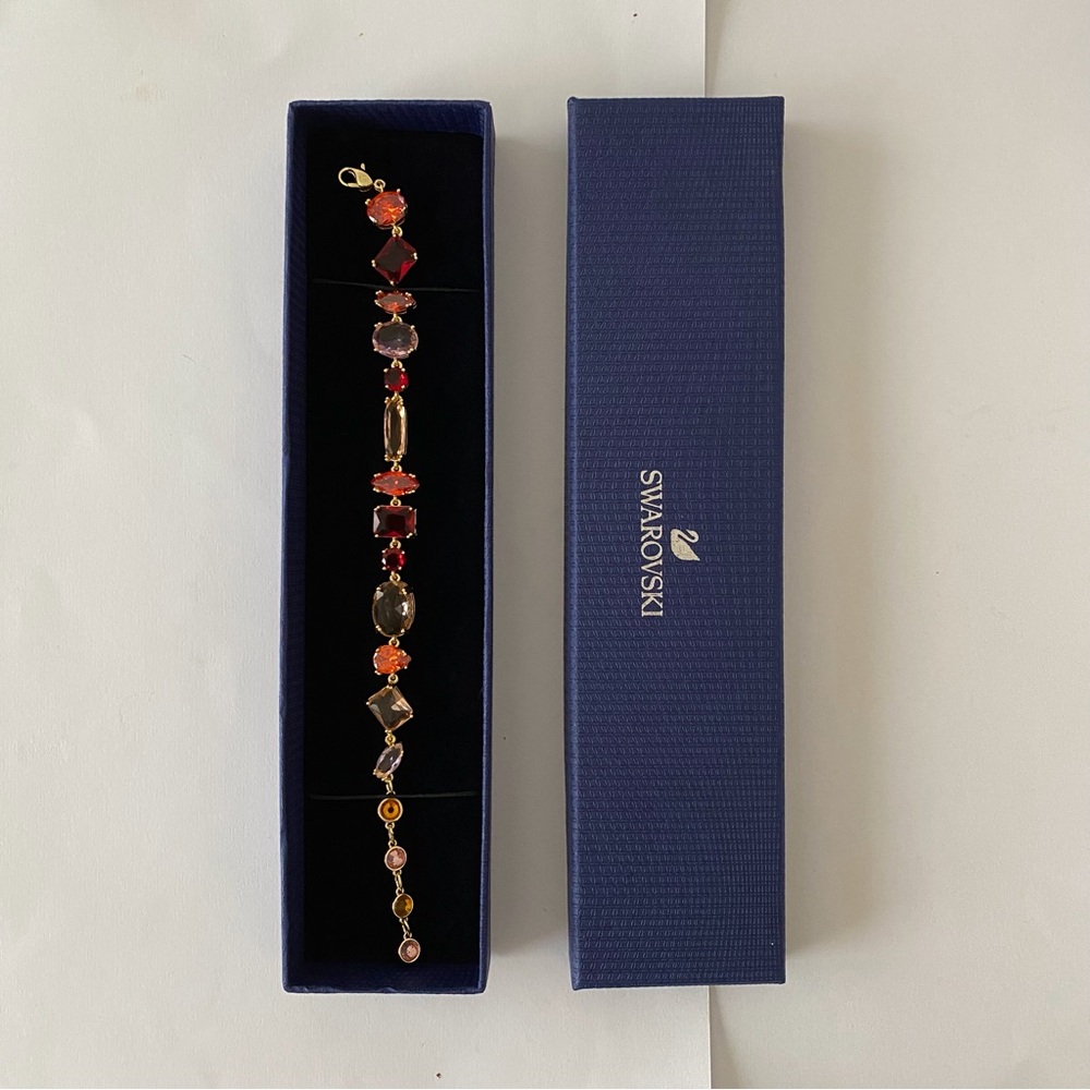 New in Box $249 Swarovski Gema Red Pink Orange Crystals Gold Tone Bracelet